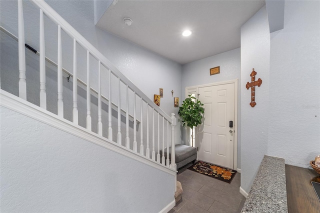 4927 SW 45th Cir, Ocala, FL 34474 - foyer featuring stairs, tile patterned floors, a textured wall, and recessed lighting