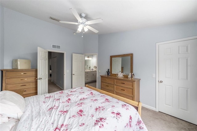 4927 SW 45th Cir, Ocala, FL 34474 - bedroom featuring carpet flooring, baseboards, a ceiling fan, and connected bathroom
