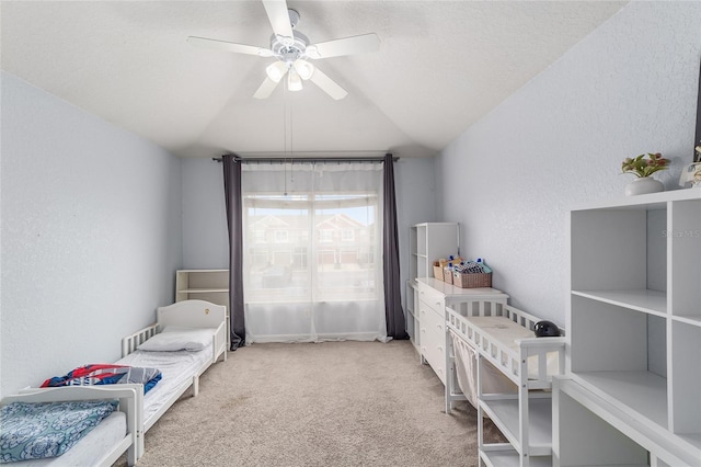 4927 SW 45th Cir, Ocala, FL 34474 - carpeted bedroom with a textured wall and a ceiling fan