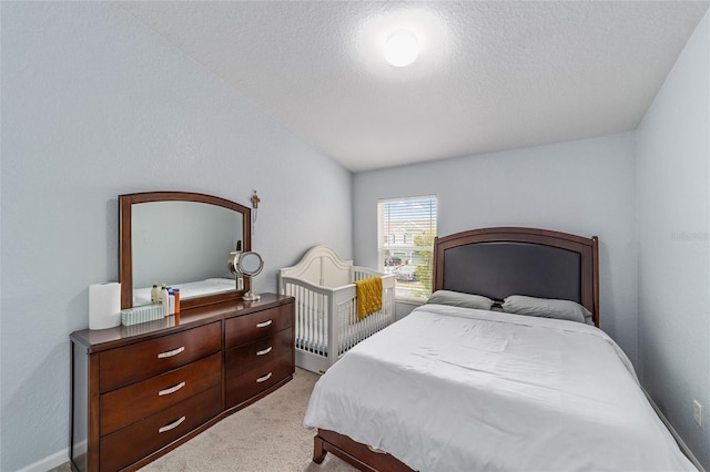 4927 SW 45th Cir, Ocala, FL 34474 - bedroom featuring light carpet, a textured ceiling, and lofted ceiling