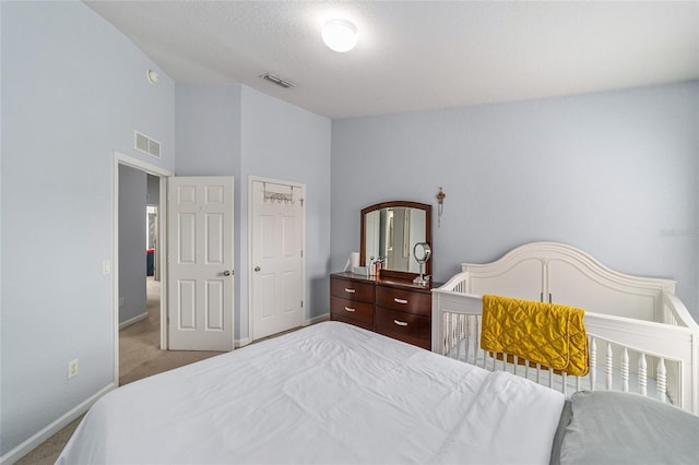 4927 SW 45th Cir, Ocala, FL 34474 - bedroom featuring carpet floors, baseboards, and high vaulted ceiling