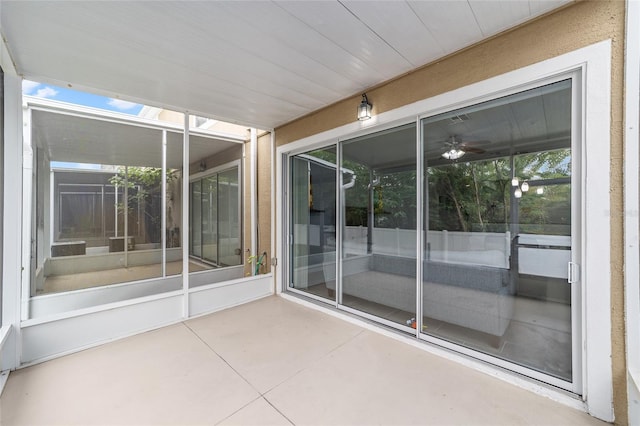 4927 SW 45th Cir, Ocala, FL 34474 - unfurnished sunroom with a ceiling fan