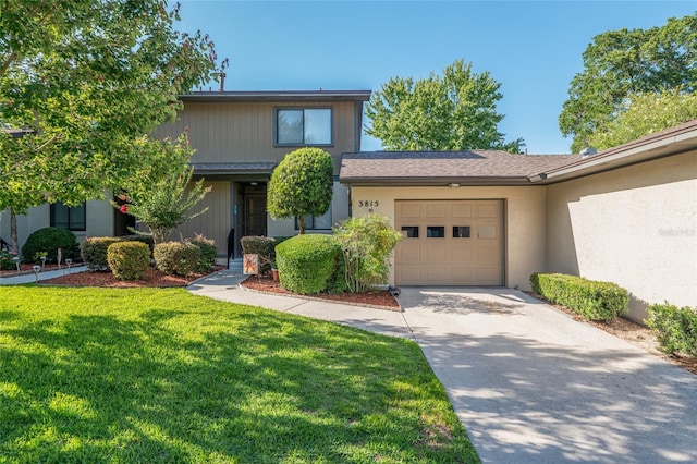 3815 NE 17th Street Cir, Ocala, FL 34470 - view of front of property with driveway, a garage, and a front lawn