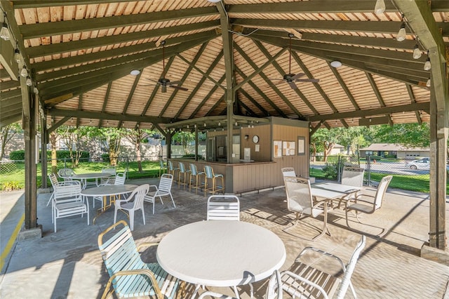 3815 NE 17th Street Cir, Ocala, FL 34470 - view of patio / terrace featuring a gazebo, ceiling fan, fence, and outdoor dining space