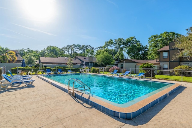 3815 NE 17th Street Cir, Ocala, FL 34470 - community pool with fence and a patio area