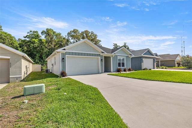 6557 SE 4th Ln, Ocala, FL 34472 - ranch-style home featuring board and batten siding, an attached garage, concrete driveway, and a front lawn