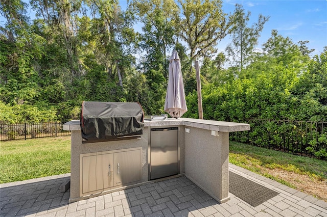 6557 SE 4th Ln, Ocala, FL 34472 - view of patio / terrace featuring a grill and area for grilling