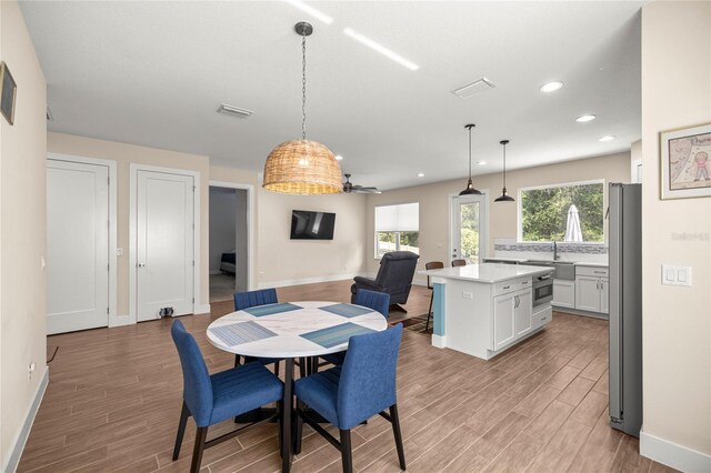6557 SE 4th Ln, Ocala, FL 34472 - dining room with light wood-style floors, baseboards, and recessed lighting