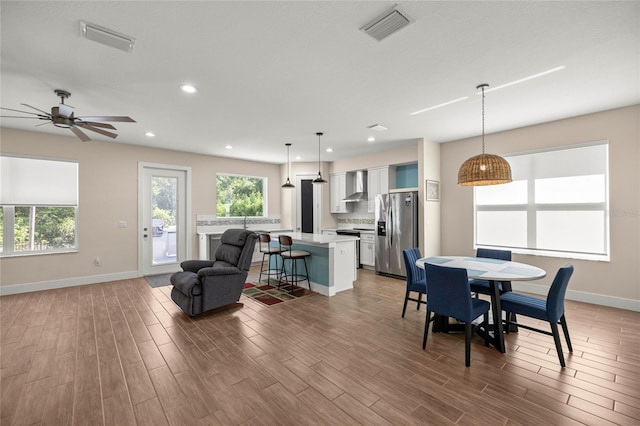 6557 SE 4th Ln, Ocala, FL 34472 - dining area featuring plenty of natural light, wood finished floors, baseboards, and recessed lighting