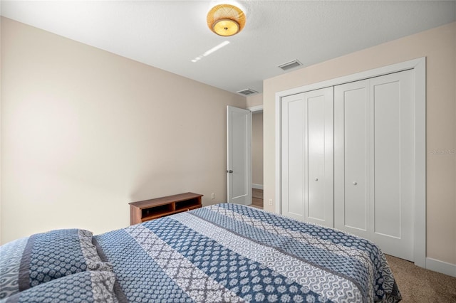 6557 SE 4th Ln, Ocala, FL 34472 - bedroom featuring carpet, a closet, and baseboards