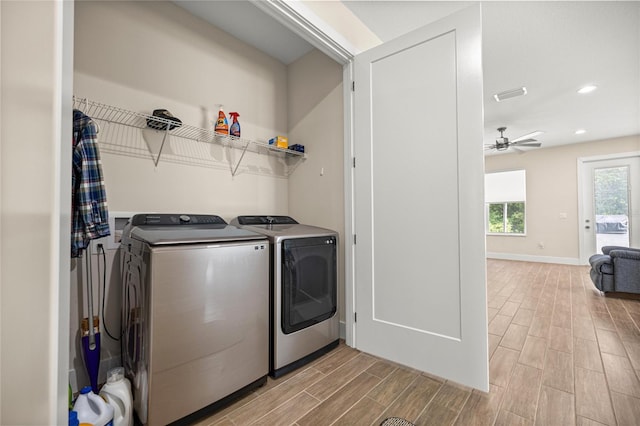 6557 SE 4th Ln, Ocala, FL 34472 - clothes washing area with wood finish floors, washing machine and dryer, baseboards, ceiling fan, and recessed lighting
