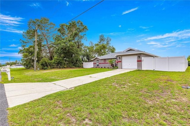 single story home featuring concrete driveway, an attached garage, and stucco siding