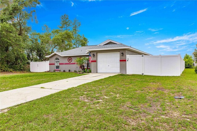 ranch-style home featuring driveway, a garage, stucco siding, and a gate