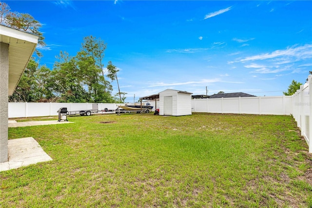 view of yard with a storage unit and an outdoor structure