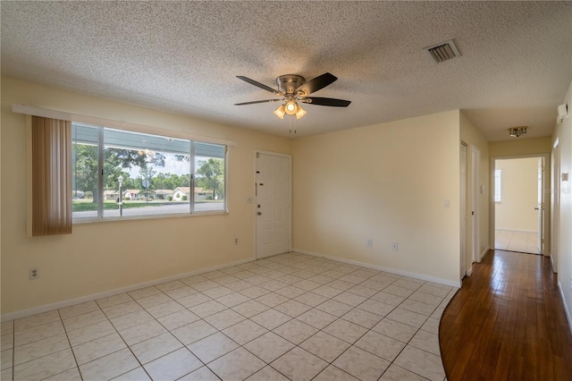 8463 SW 108th Pl, Ocala, FL 34481 - unfurnished room with a ceiling fan and a textured ceiling