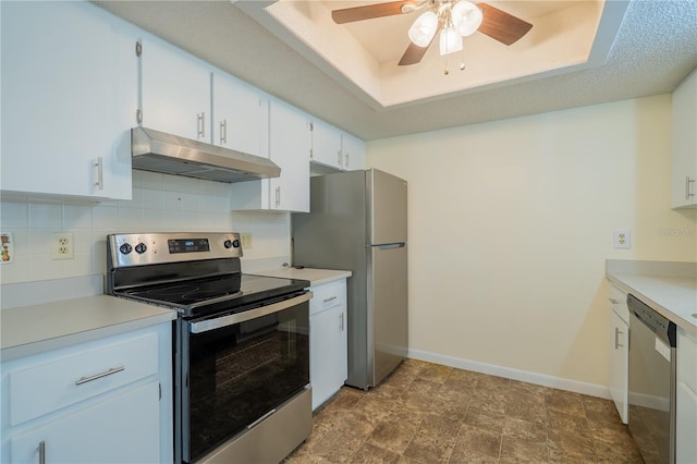 8463 SW 108th Pl, Ocala, FL 34481 - kitchen with appliances with stainless steel finishes, under cabinet range hood, decorative backsplash, ceiling fan, and light countertops