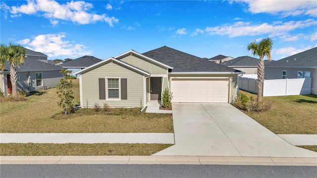 ranch-style home with an attached garage and driveway