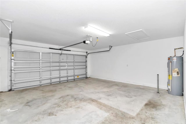 garage featuring water heater and a garage door opener