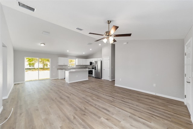 25 Juniper Pass Way, Ocala, FL 34480 - unfurnished living room featuring lofted ceiling, ceiling fan, baseboards, light wood-style flooring, and recessed lighting