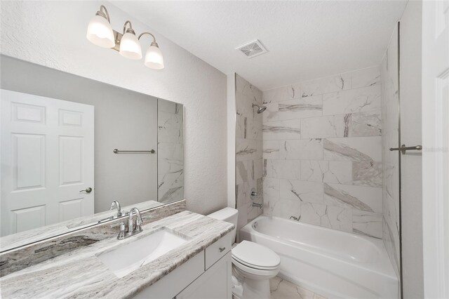 25 Juniper Pass Way, Ocala, FL 34480 - full bathroom with toilet, tub / shower combination, vanity, marble finish floors, and a textured wall