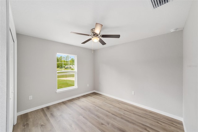 25 Juniper Pass Way, Ocala, FL 34480 - unfurnished room featuring light wood-type flooring, a ceiling fan, baseboards, and a smoke detector