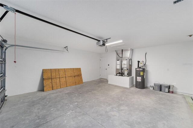 25 Juniper Pass Way, Ocala, FL 34480 - garage featuring electric water heater, heating unit, and a garage door opener