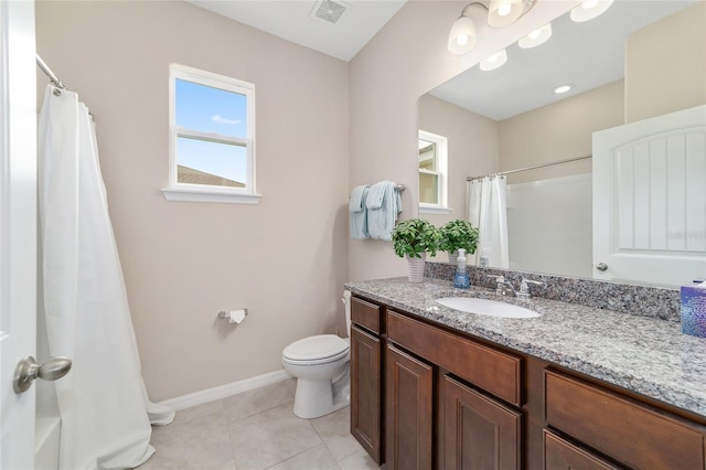 5653 SW 50th Ter, Ocala, FL 34474 - bathroom featuring toilet, baseboards, a shower with curtain, tile patterned floors, and vanity