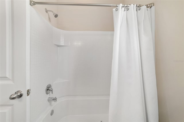 5653 SW 50th Ter, Ocala, FL 34474 - bathroom featuring shower / tub combo with curtain