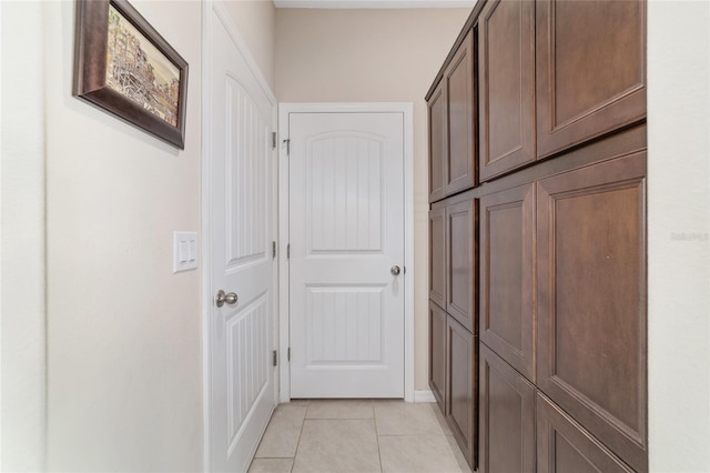 5653 SW 50th Ter, Ocala, FL 34474 - corridor with light tile patterned flooring