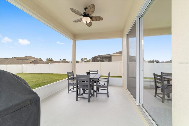 5653 SW 50th Ter, Ocala, FL 34474 - view of patio / terrace with outdoor dining area and ceiling fan