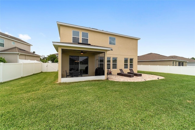 5653 SW 50th Ter, Ocala, FL 34474 - rear view of property featuring a patio area, stucco siding, and ceiling fan