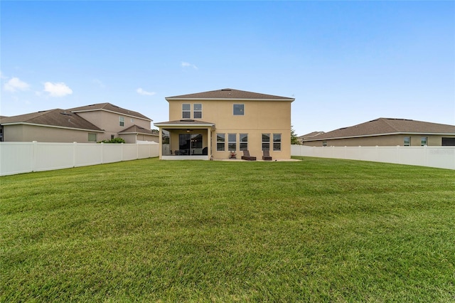 5653 SW 50th Ter, Ocala, FL 34474 - back of house with a sunroom and stucco siding