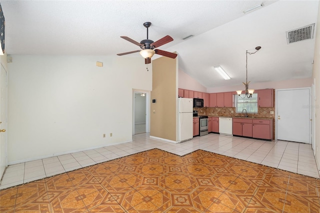 kitchen with white appliances, light tile patterned flooring, a ceiling fan, decorative backsplash, and high vaulted ceiling
