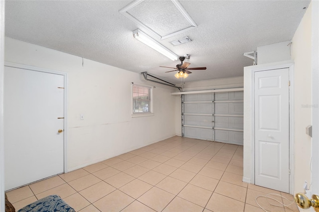 garage with ceiling fan