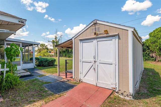 view of shed featuring a sunroom