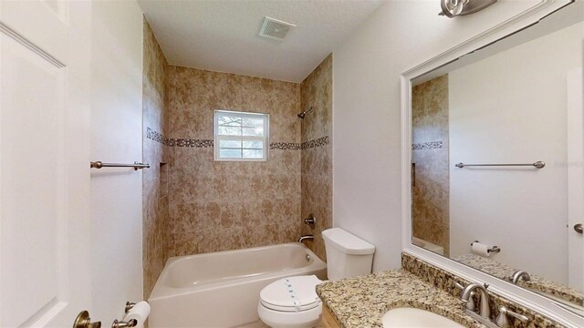10528 SW 27th Ave, Ocala, FL 34476 - bathroom with toilet, shower / tub combination, and vanity