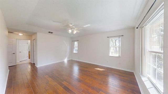10528 SW 27th Ave, Ocala, FL 34476 - spare room with ceiling fan, hardwood / wood-style flooring, and baseboards