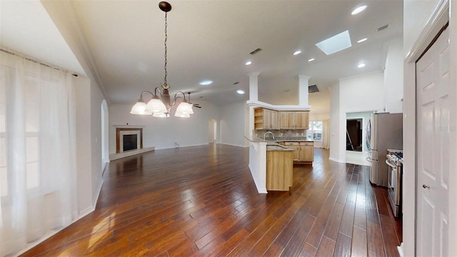 10528 SW 27th Ave, Ocala, FL 34476 - kitchen featuring open floor plan, a chandelier, backsplash, a sink, and open shelves