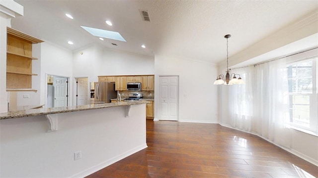 10528 SW 27th Ave, Ocala, FL 34476 - kitchen with stainless steel appliances, a breakfast bar, open shelves, dark wood-type flooring, and plenty of natural light