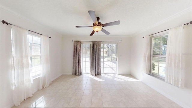 10528 SW 27th Ave, Ocala, FL 34476 - spare room featuring ceiling fan, light tile patterned floors, crown molding, and baseboards