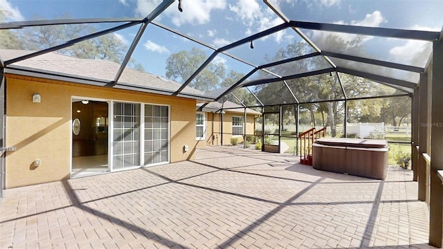10528 SW 27th Ave, Ocala, FL 34476 - view of patio / terrace with a hot tub and glass enclosure