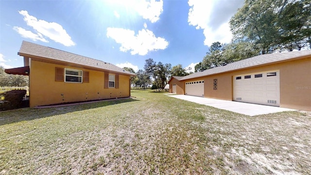 10528 SW 27th Ave, Ocala, FL 34476 - view of home's exterior featuring driveway, stucco siding, a lawn, and a garage