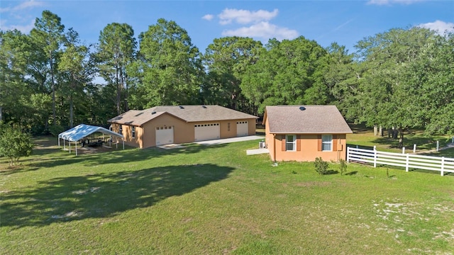 10528 SW 27th Ave, Ocala, FL 34476 - rear view of property with a detached garage, an outdoor structure, and stucco siding