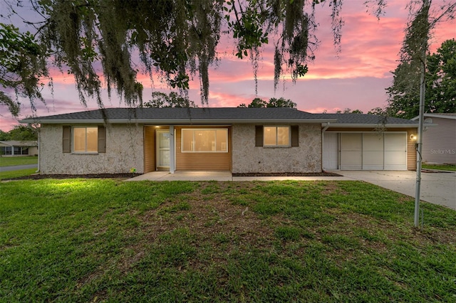 8463 SW 108th Ln, Ocala, FL 34481 - single story home with a garage, driveway, a yard, and stucco siding