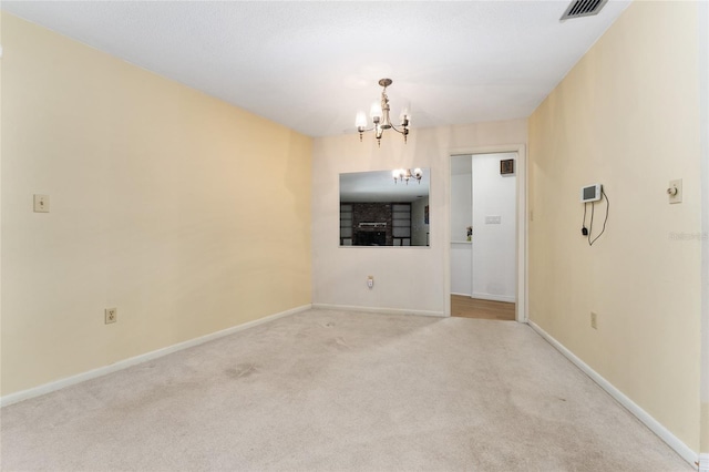 2146 NE 9th St, Ocala, FL 34470 - unfurnished dining area featuring a chandelier, carpet, and baseboards