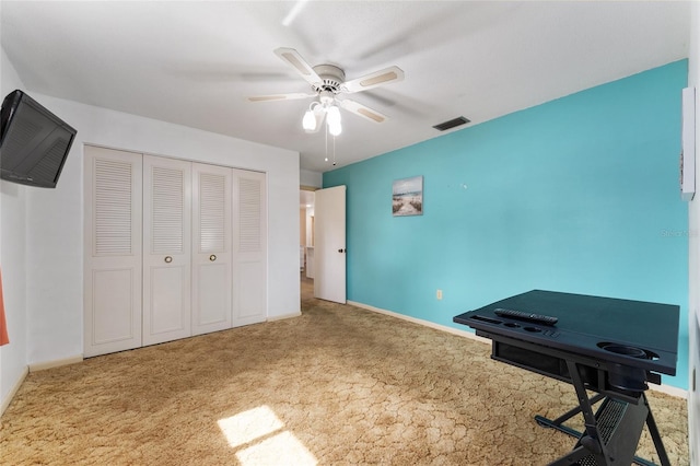 2146 NE 9th St, Ocala, FL 34470 - unfurnished bedroom featuring carpet flooring, a closet, baseboards, and ceiling fan