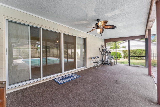 2146 NE 9th St, Ocala, FL 34470 - unfurnished sunroom featuring ceiling fan