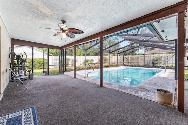 2146 NE 9th St, Ocala, FL 34470 - view of swimming pool with a fenced backyard, a patio area, glass enclosure, and ceiling fan
