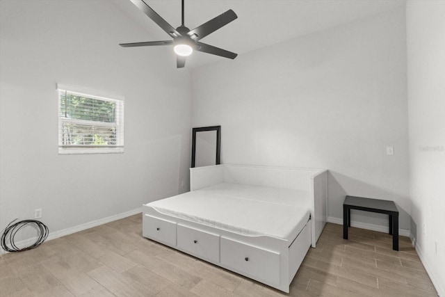 3728 S Eastpark Way, Homosassa, FL 34446 - bedroom featuring baseboards, light wood-style flooring, and a ceiling fan