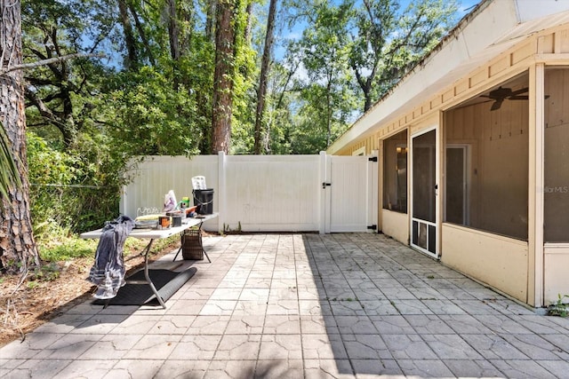 3728 S Eastpark Way, Homosassa, FL 34446 - view of patio featuring a gate and a sunroom